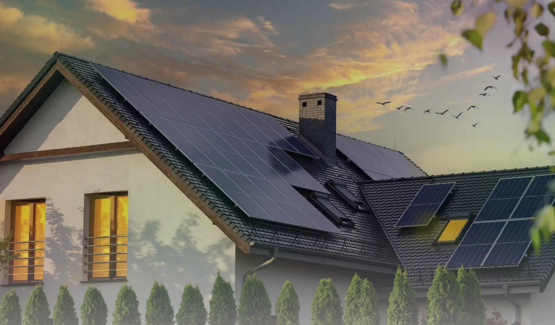 A house with solar panels installed on the roof during sunset, showcasing how much you can save with solar while promoting renewable energy and sustainability